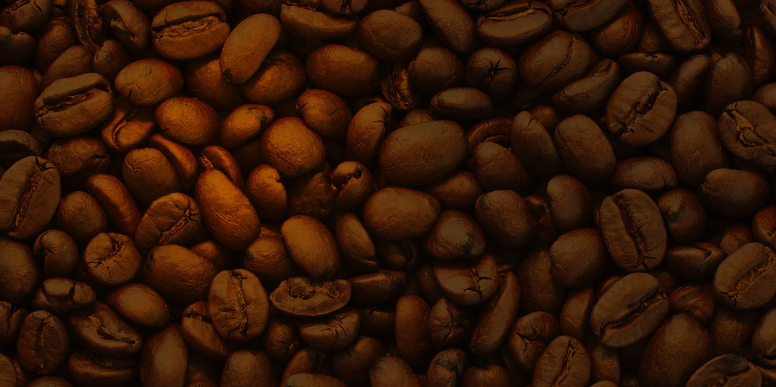 Brown background image of coffee beans